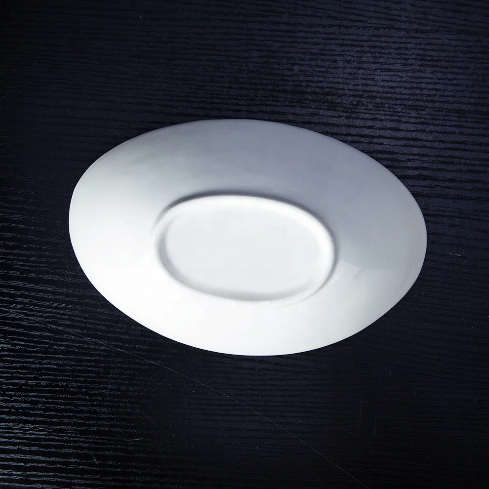 Shengjing High Quality Simple White Ceramic Irregular Boat Shaped Salad Bowl