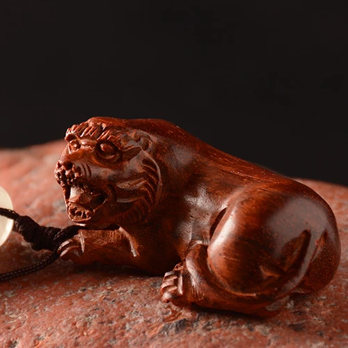 red ebony Chinese zodiac sculpture