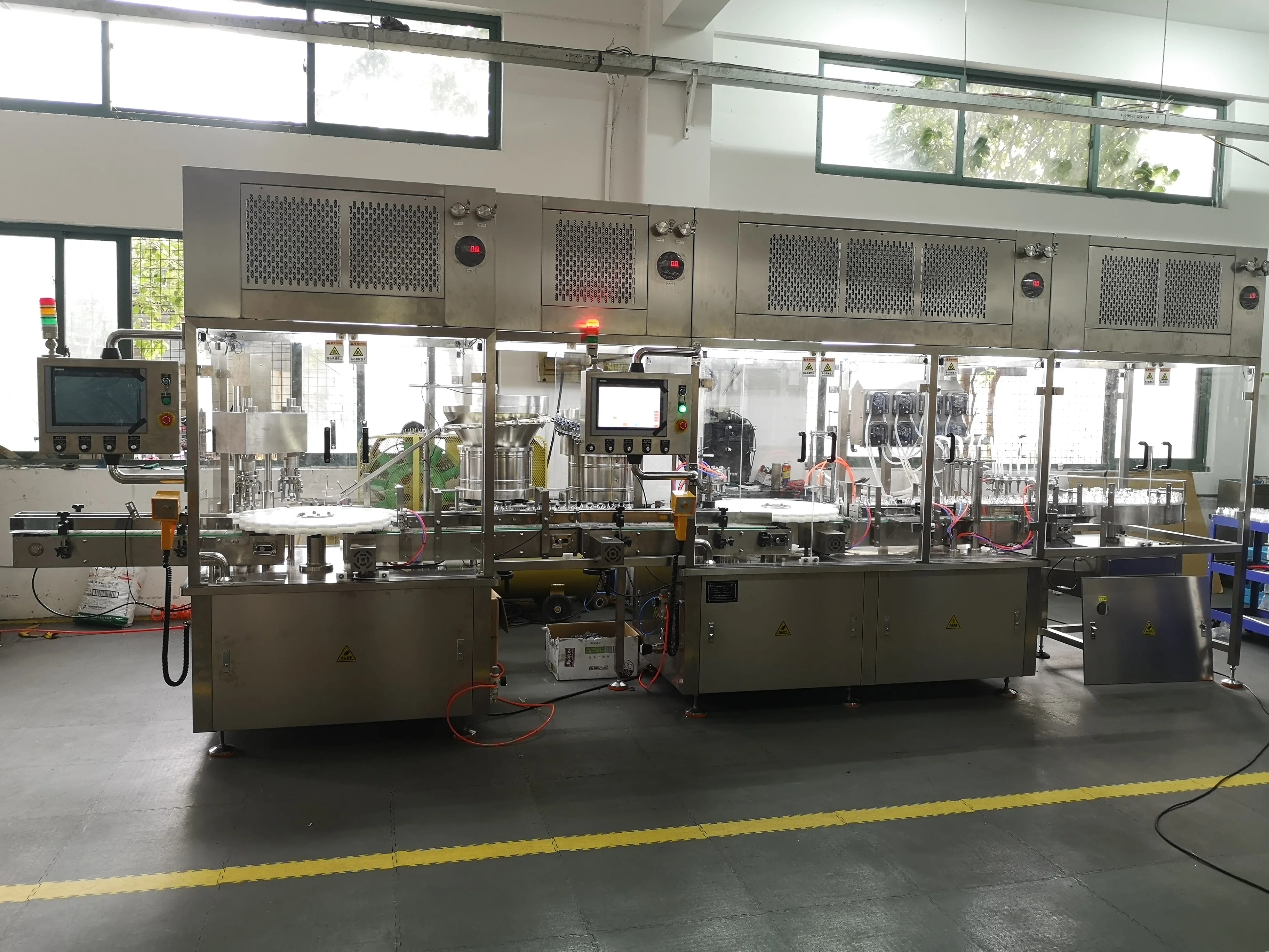 Glass bottle infusion stoppering and capping oral liquid filling line