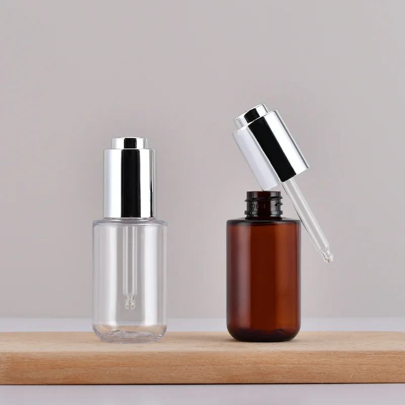 High Quality Luxury Cosmetic Amber Essential Oil Press Pump Dropper Bottle 50 ml