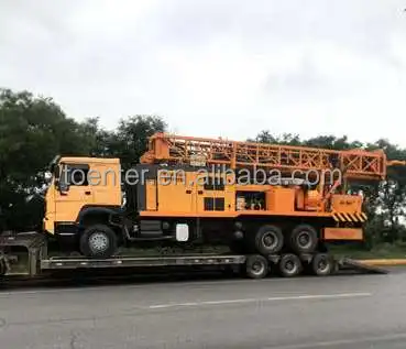 Vehicle-mounted large down-the-hole drilling rig and air compressor integrated car drill