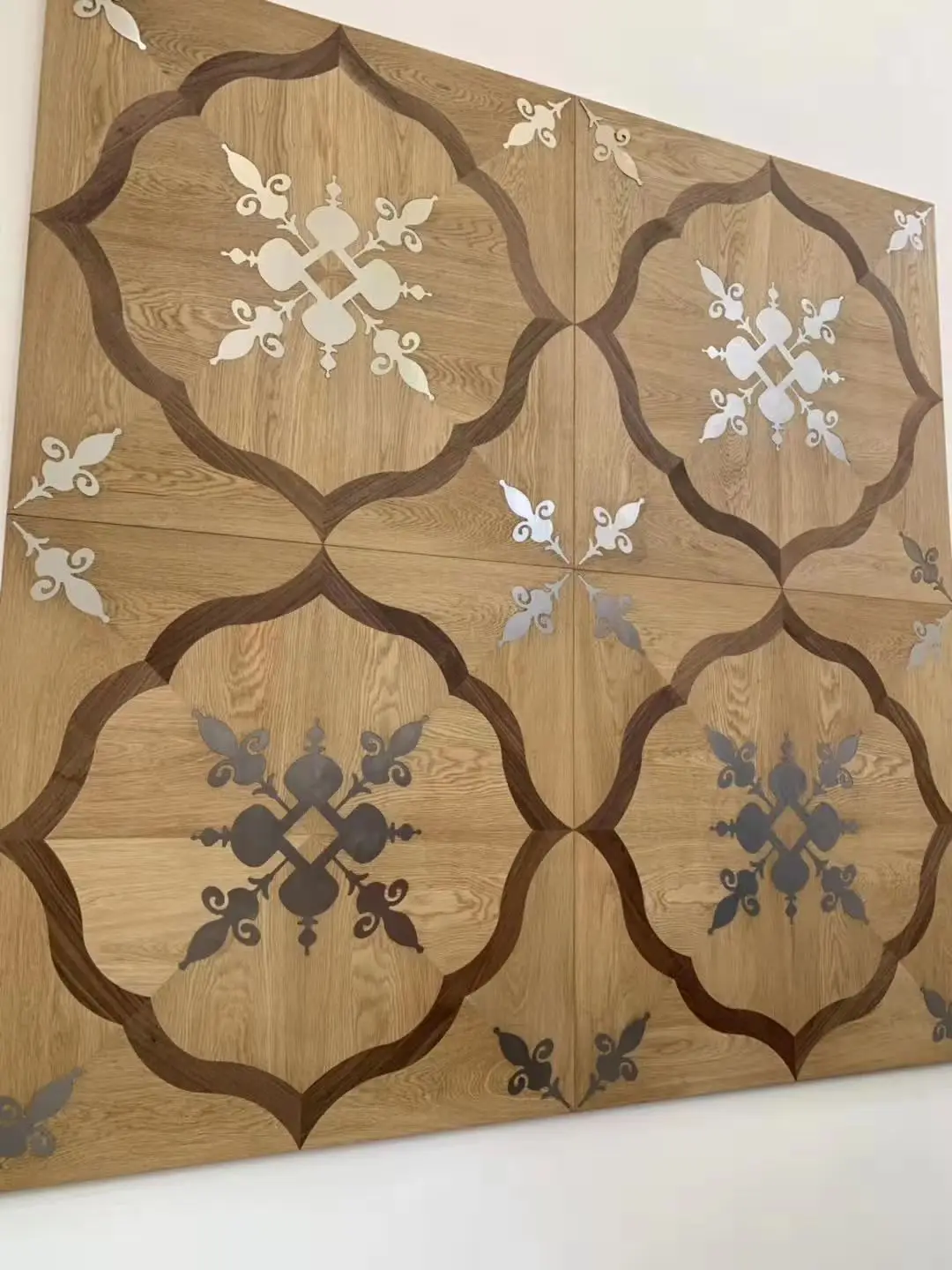 Hardwood floor medallions inlays for new and existing floors patterned design