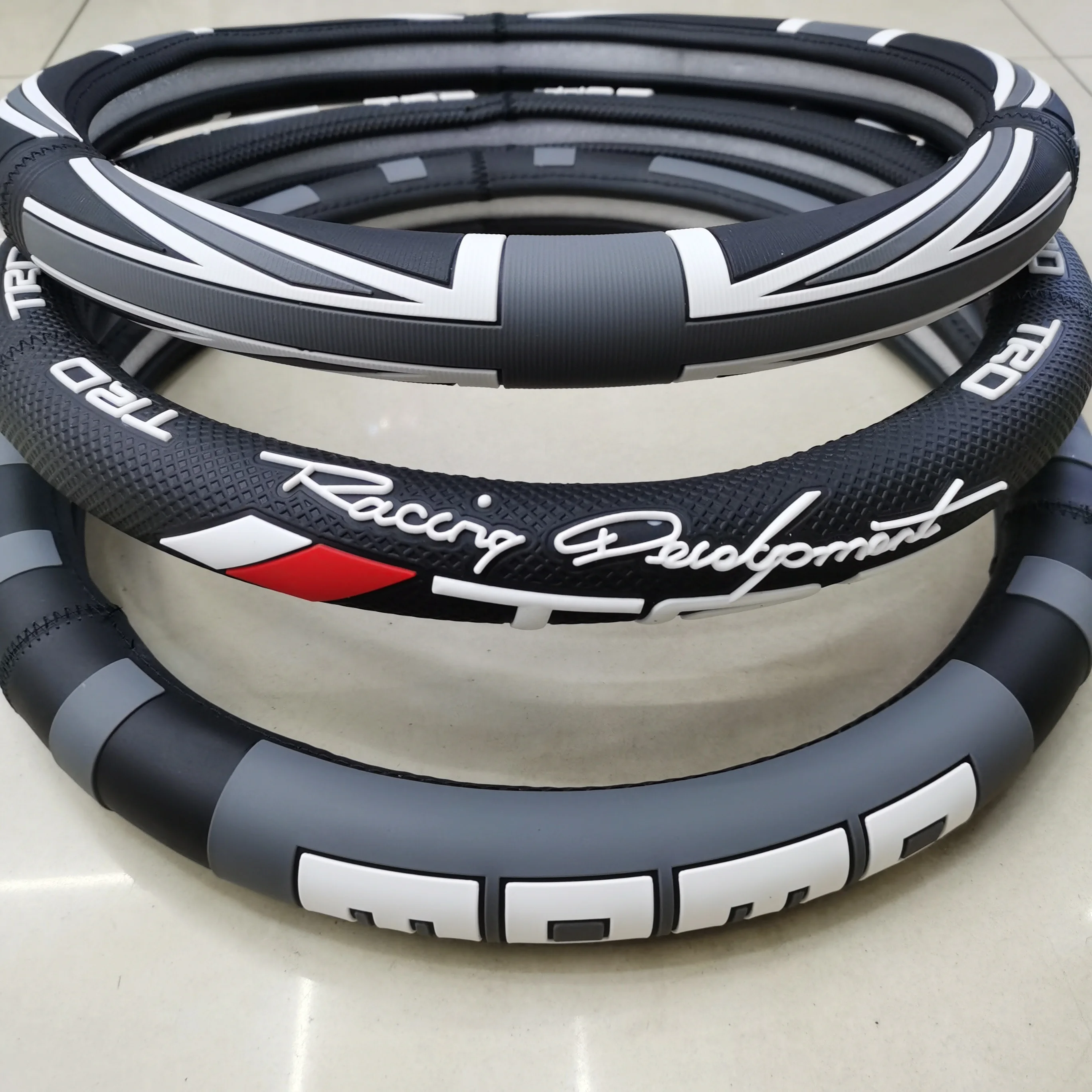 Silicone steering wheel cover, environmentally friendly and tasteless, with various LOGO and car LOGO