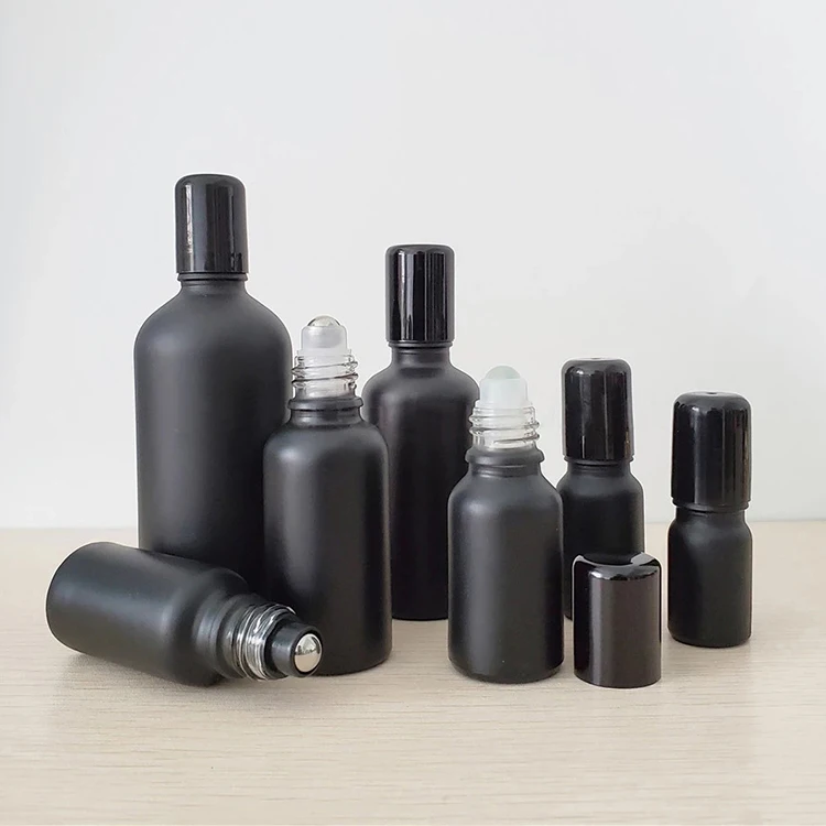 Customized wholesale 30ml 50ml matte black frosted Glass Roll on Bottle with Metal Stainless Roller Ball for essential oil