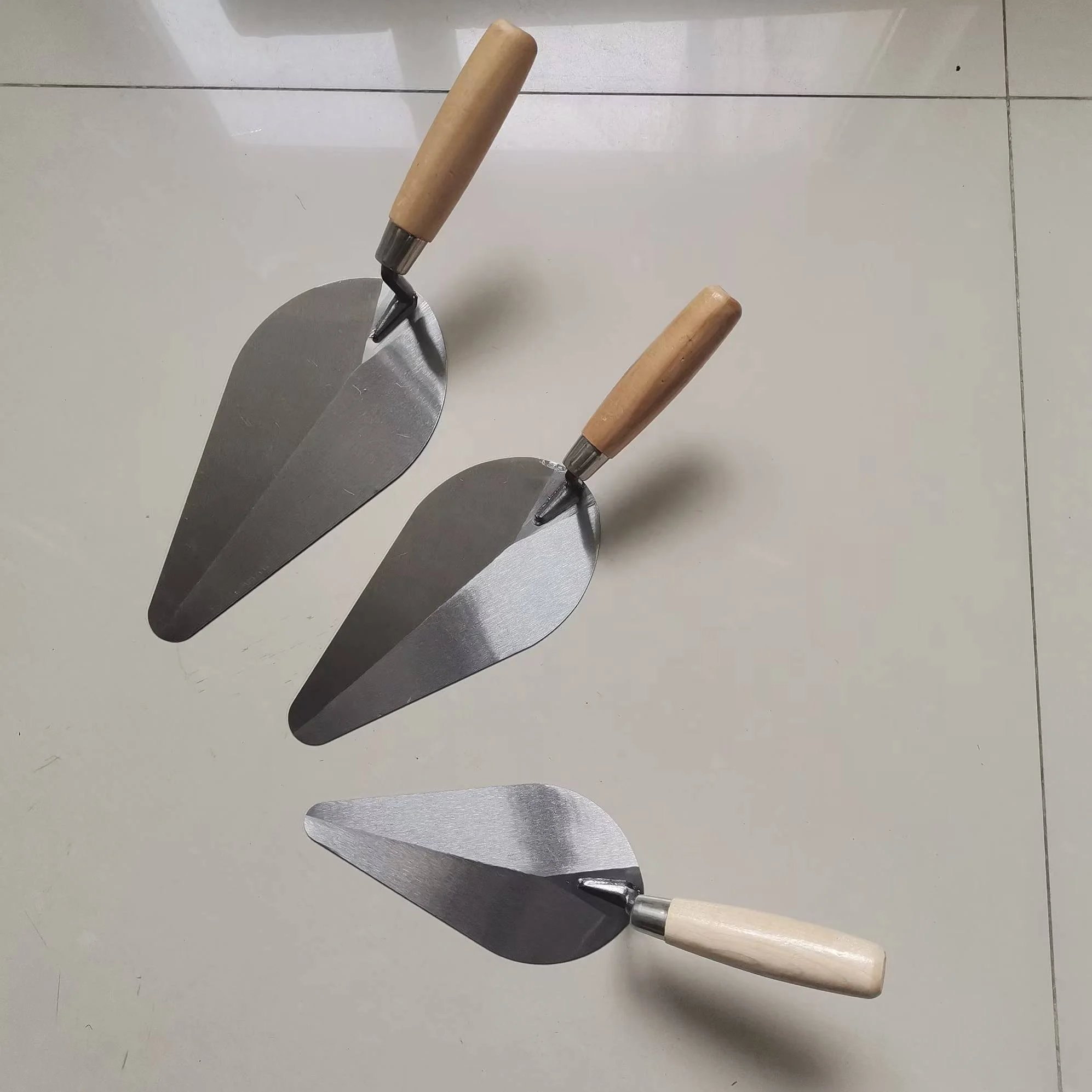 Top Grade Construction Works Concrete Bricklaying Trowels with Hardened Sharp Blade