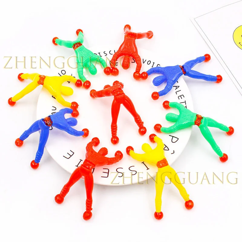 Zhengguang Wholesale Stretchy Climbing Man Window Crawlers Sticky Toys Favors Kid Play Climbing Toy Sticky Wall Climbing Toy