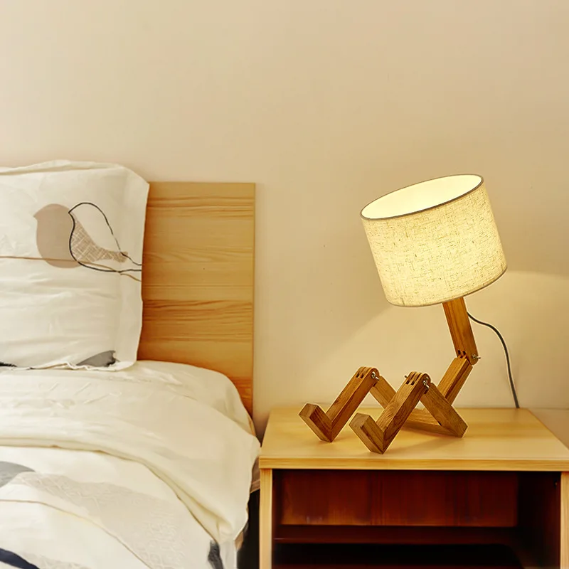 Solid wood humanoid lamp creative Nordic fashion style study bedroom bedside desk light wood robot folding LED table lamp
