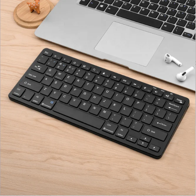 Slim ergonomic mini blue tooth bt wirelessrechargeable keyboard for ipad mobile phones and tablets