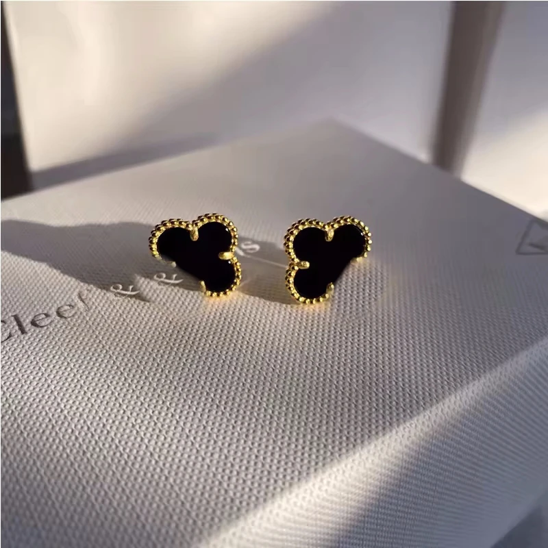 2024 New S925 Sterling silver four-leaf clover White Fritillaria Petals Fashion Earrings Women