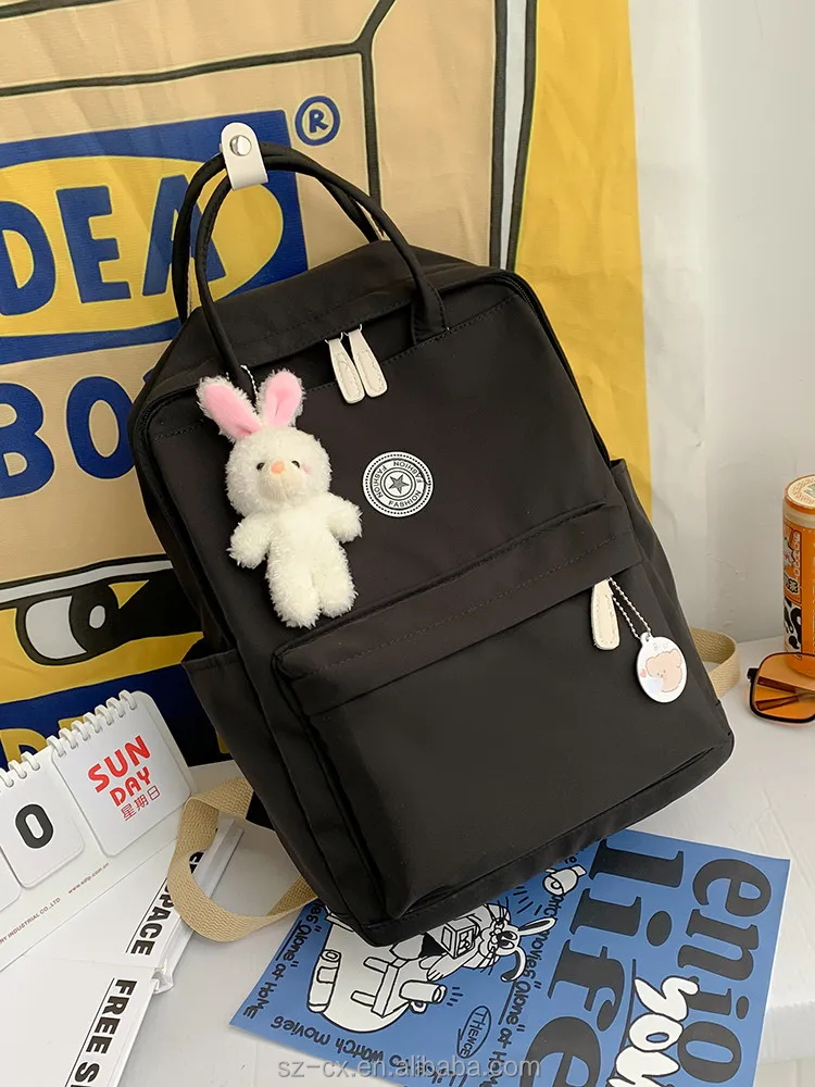 2023 fashion wholesale large capacity custom logo unisex waterproof black nylon laptop backpacks school bags for women girls