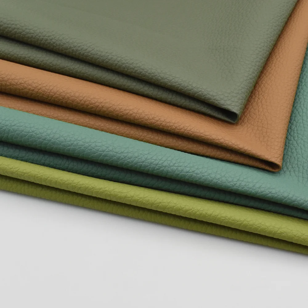 High Quality 0.8MM Green Stretch Rexine Leather Fabric Vegan Imitation Faux Leather Wall Decoration Car Seat Furniture Lining