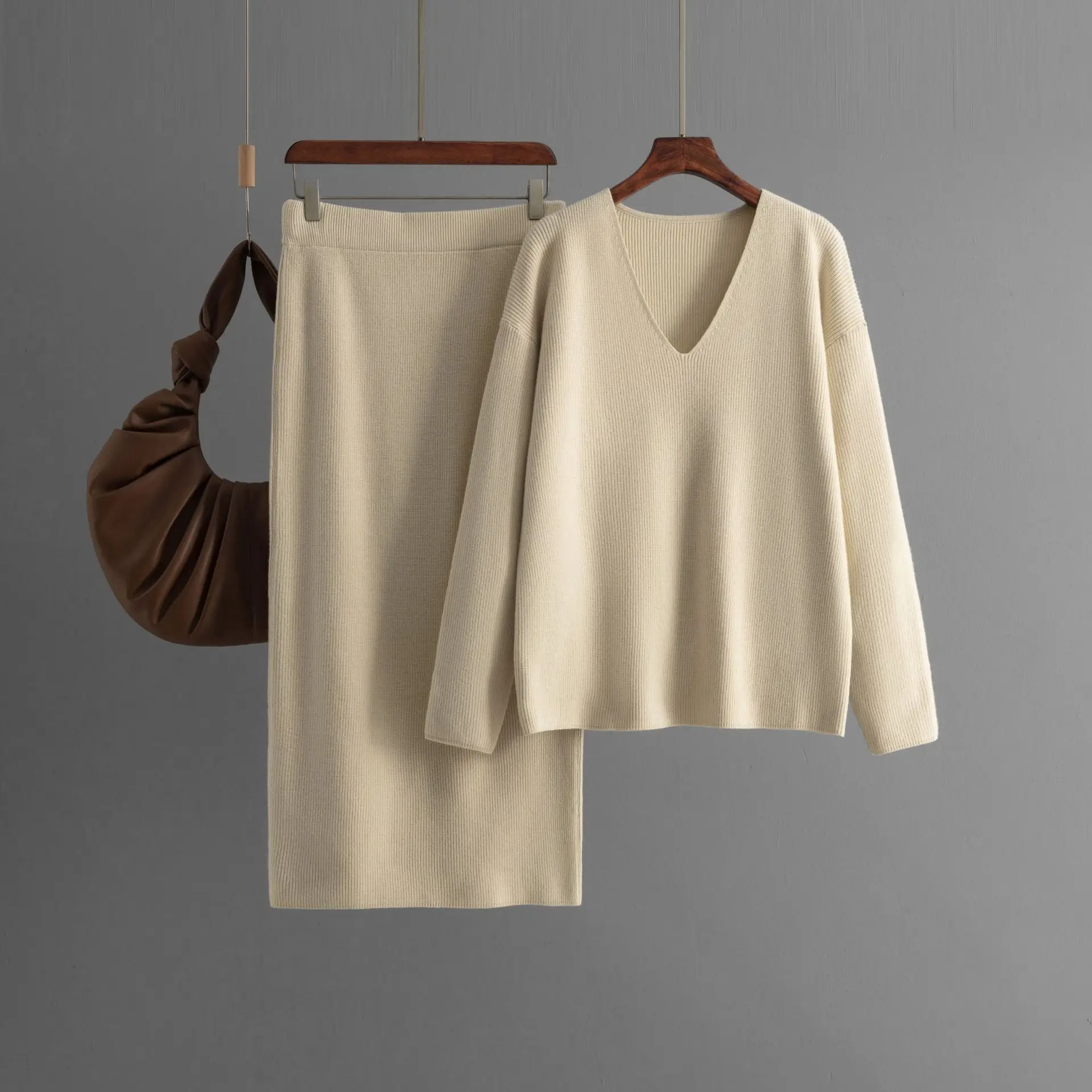 Yibaoli Manufacturer 2024 New Autumn And Winter V-neck Long Sleeve Loose Knit Skirt Sets Women 2 Piece Outfits