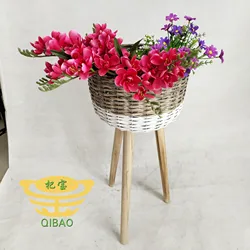 Wholesale fashion hand woven flowerpot PE rattan flowerpot with independent wooden leg outdoor flower basket