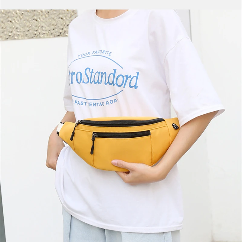 custom logo cheap unisex fanny pack wear-resistant nylon leisure fitness waist bag running bag with earphone hole