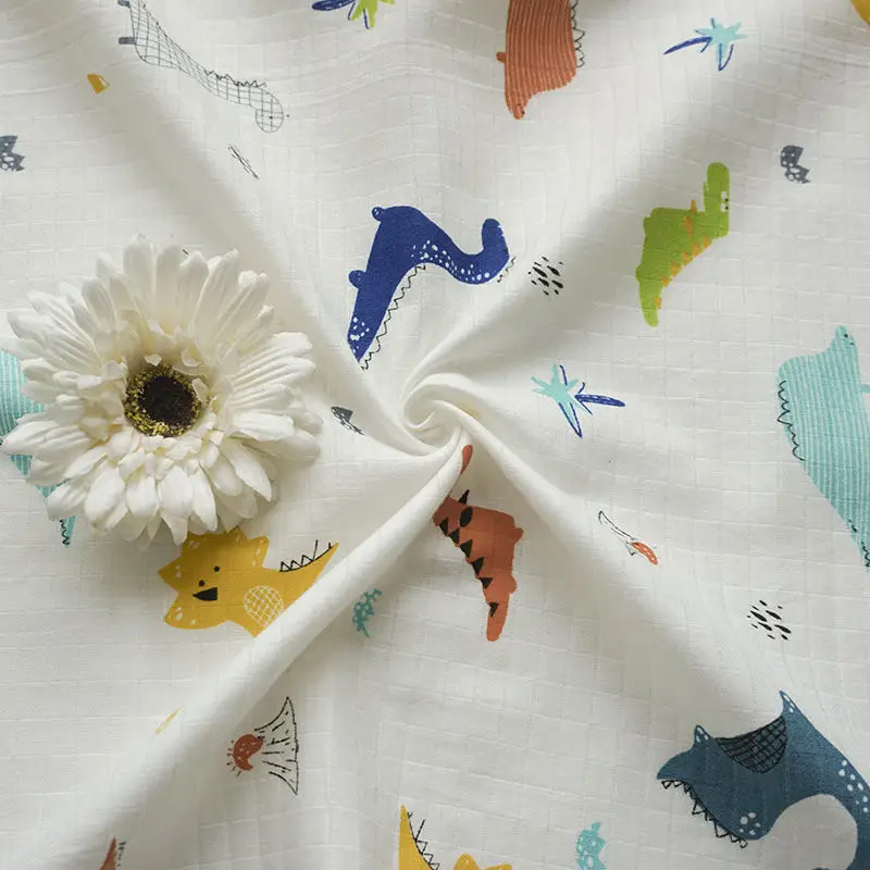 
Wholesale 100% cotton double-layer gauze cartoon small dinosaur pattern non fluorescent baby products fabric high quality lowMOQ 
