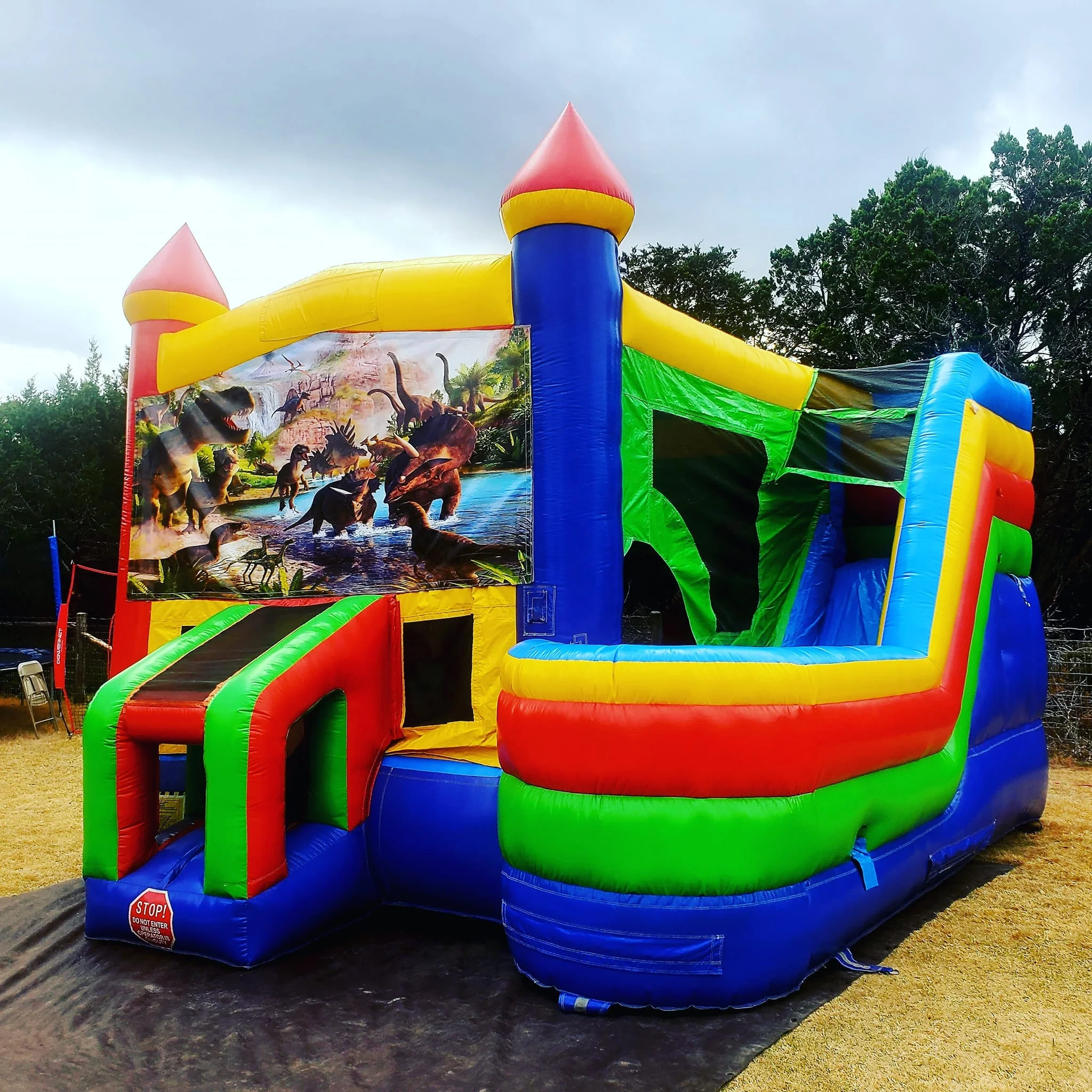 Commercial Jurassic Inflatable Dinosaurs Side Slide Combo Bouncer Slide Bounce House With Dry Wet Water Slide