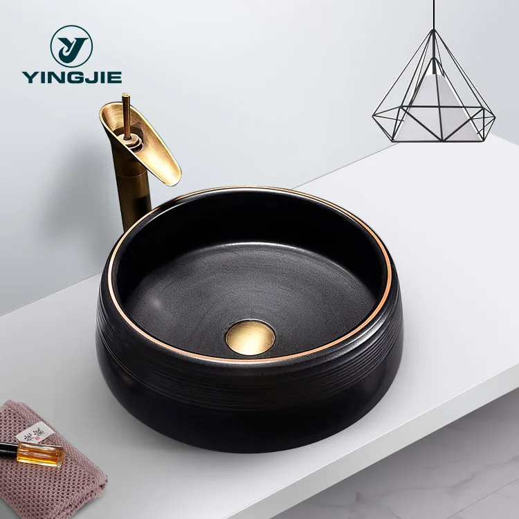 China Artistic Handmade Ceramic Wash Basin Round Counter Top Porcelain Sinks Carved Black Bathroom Sinks
