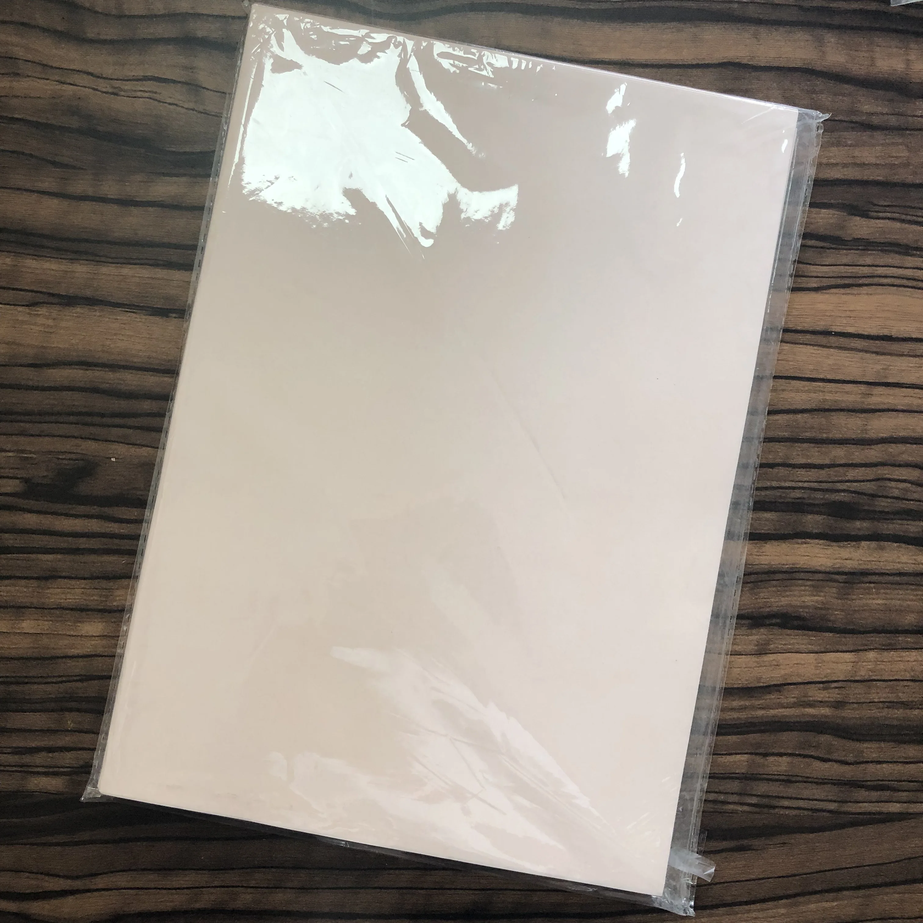 polyester sublimation  A4 size heat transfer paper 100sheet/pack for ceramic/metal coated goods and polymer