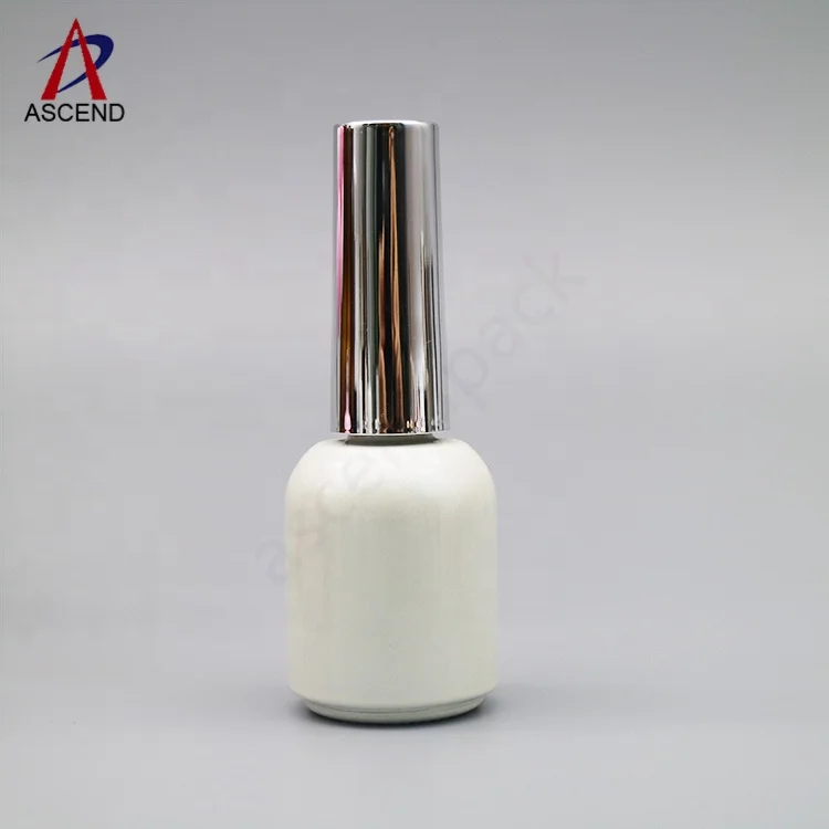 wholesale cute glossy pink color empty round shaped 10ml nail polish uv gel bottle with gel brush and long silver caps