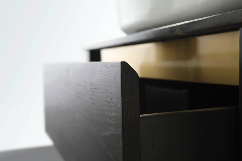 Double sink bathroom vanity with gold hardware