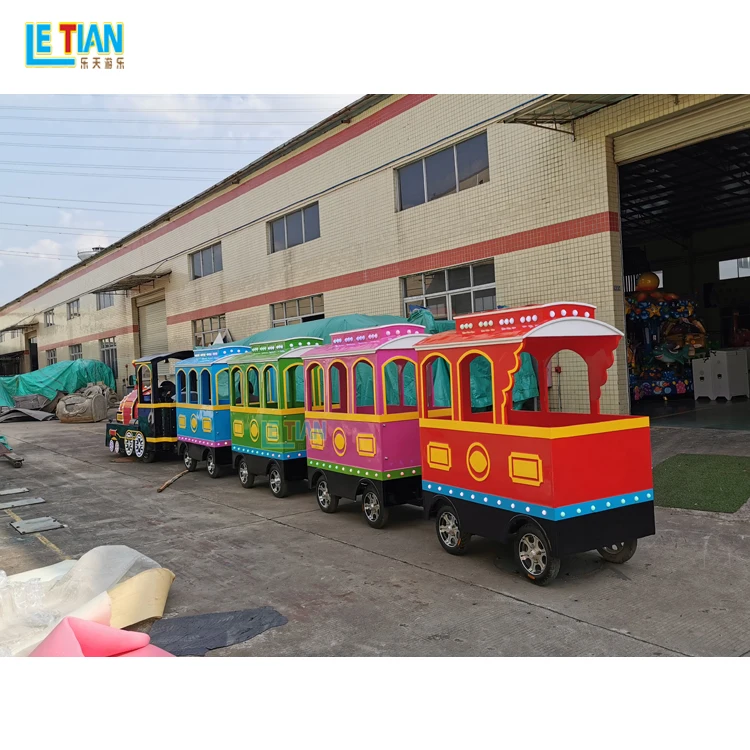 Attractive outdoor playground tourist train prices amusement park kids trackless train rides for sale