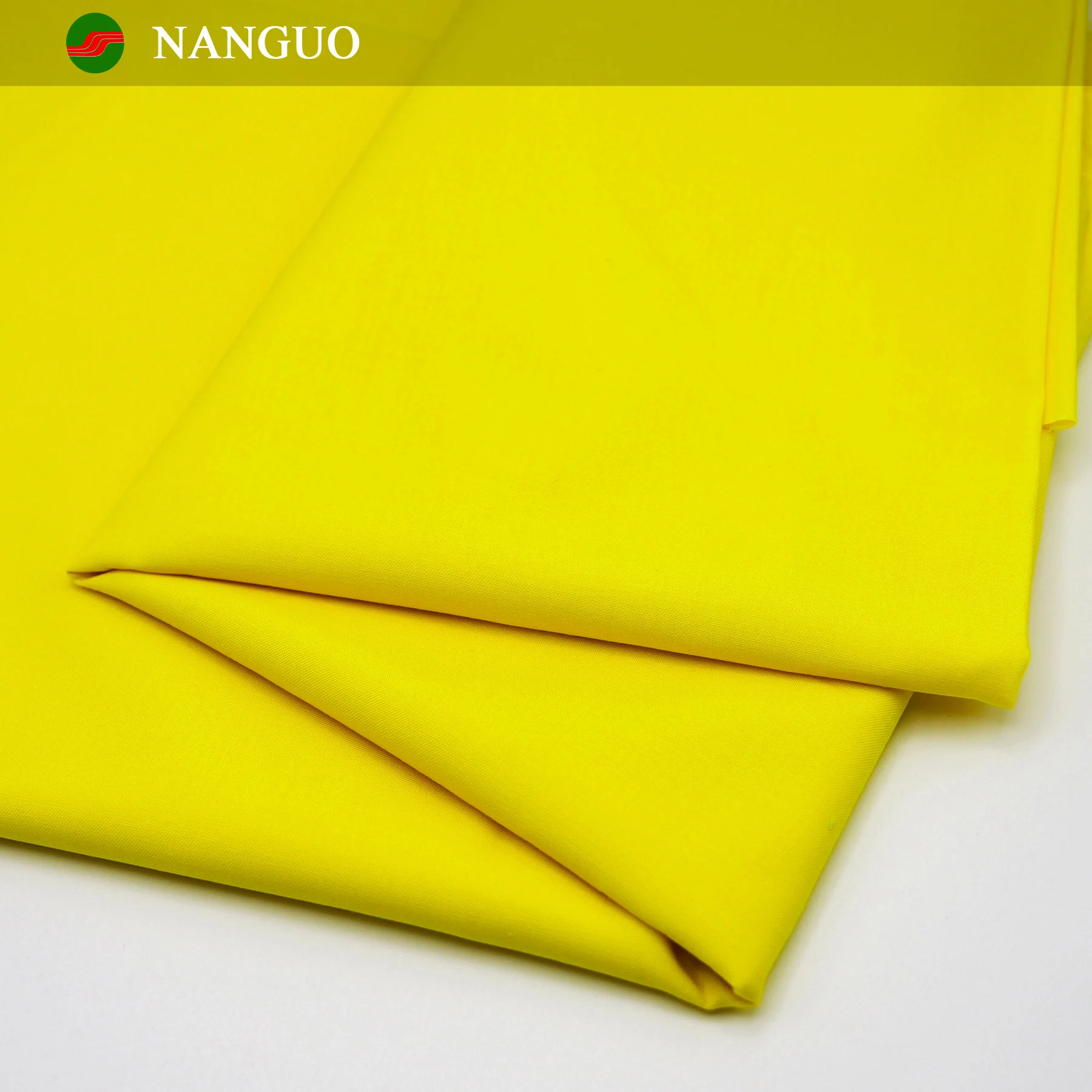 Производитель ткани Nanguo тканая однотонная окрашенная ткань из полиэстера 65 хлопок 35 21*21 100*50 175 г/м2 простая Рабочая Ткань