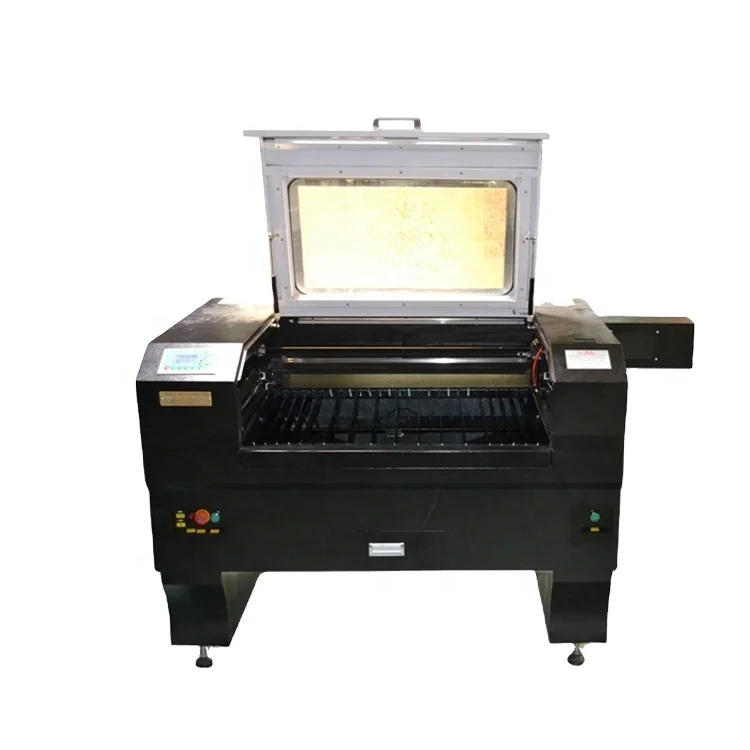 Guangzhou Hanniu 9060 CO2 laser cutting machine for fabric leather wood plastic