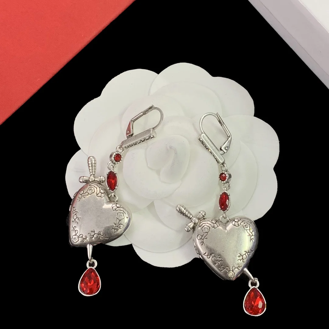 Alexander McQueens Cross border new product ins 925 silver heart inlaid zircon two-color earrings Halloween jewelry gift
