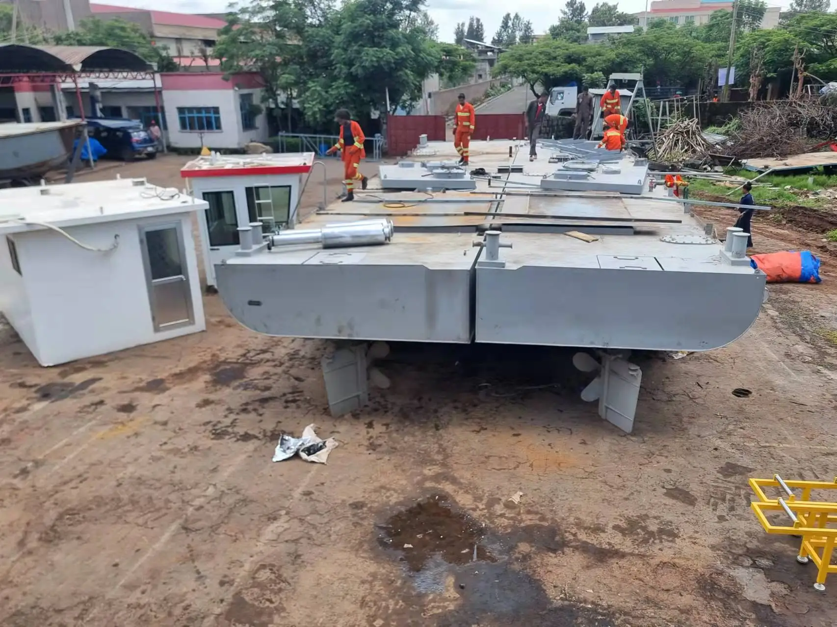 Lake construction project work boat with crane and implements tools