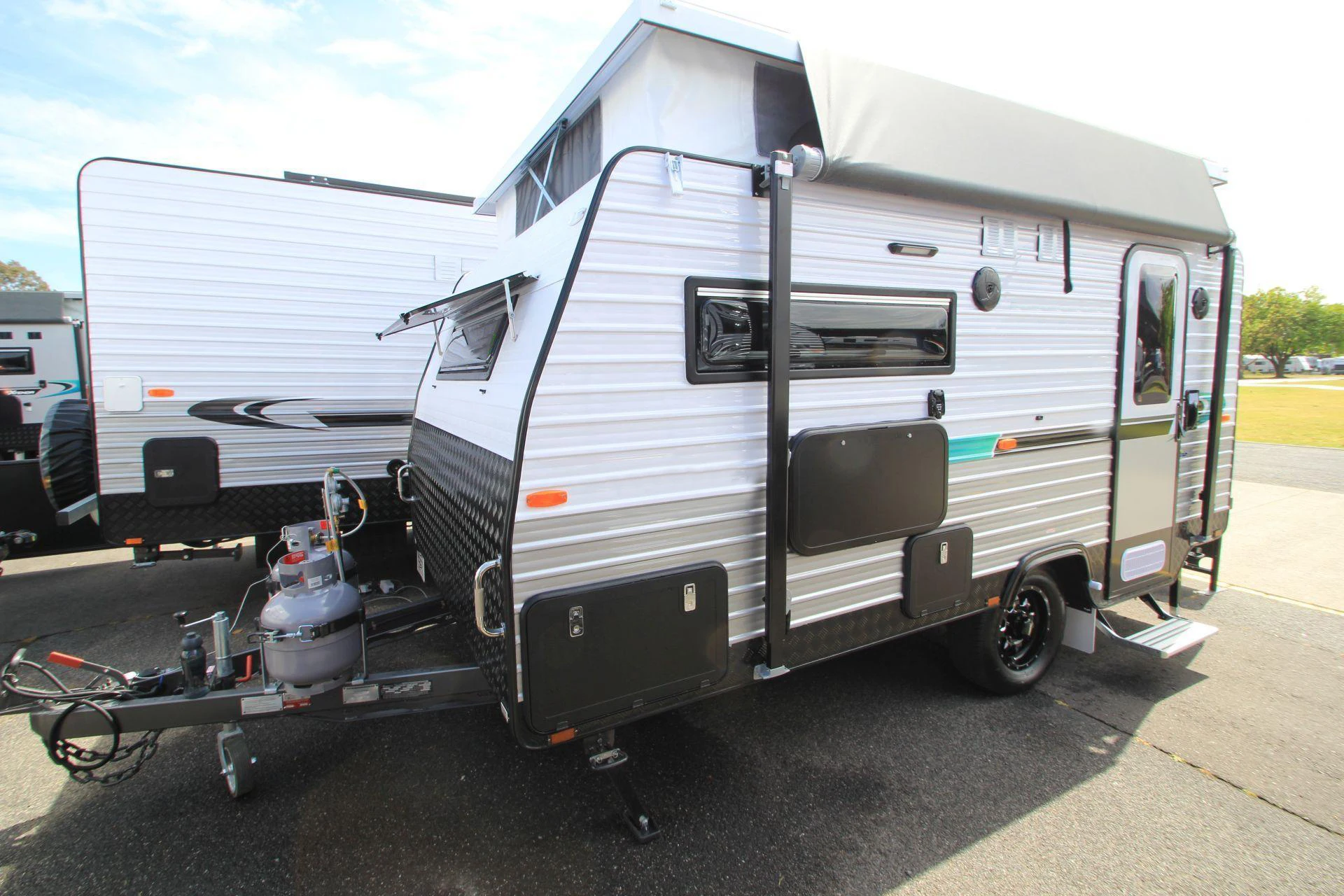 
Mini Lightweight Camping Travel Mover Pop Top Caravan Trailer Made in China 