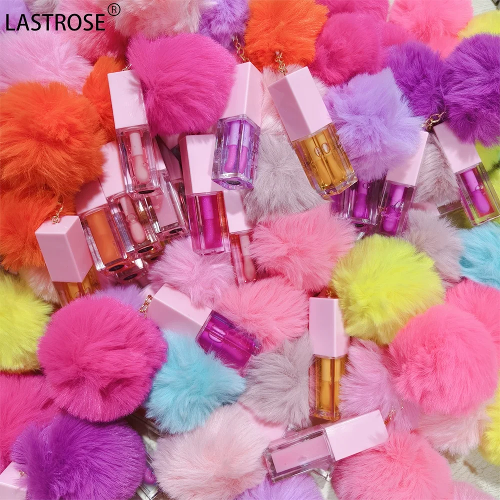 Color changing lip oil vegan glossy magic moisturizing fruit flavouring clear vegan pink lipgloss lip plumper oil with pompom