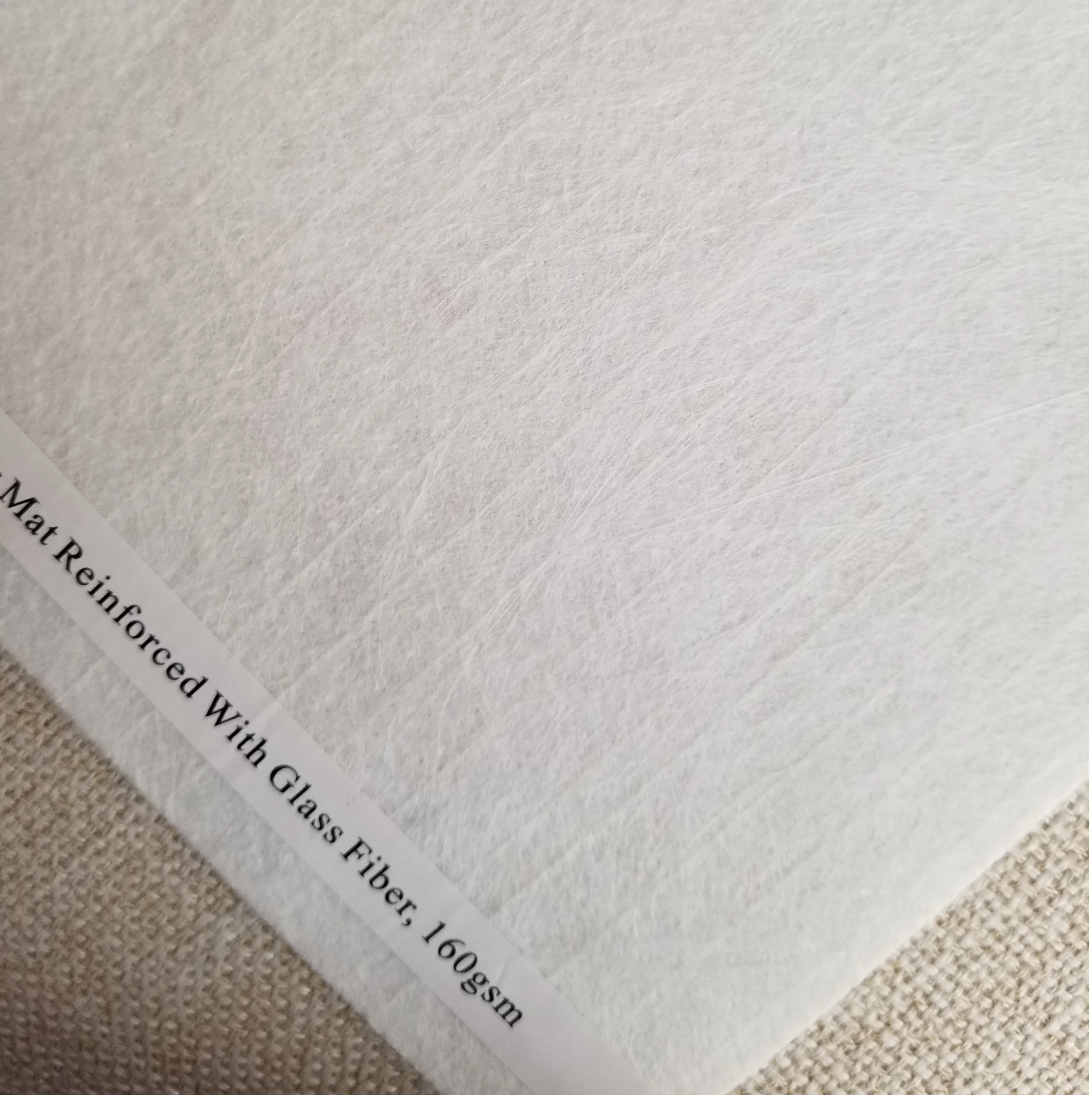 Reinforced spunbond polyester mat for APP/SBS waterproofing membrane