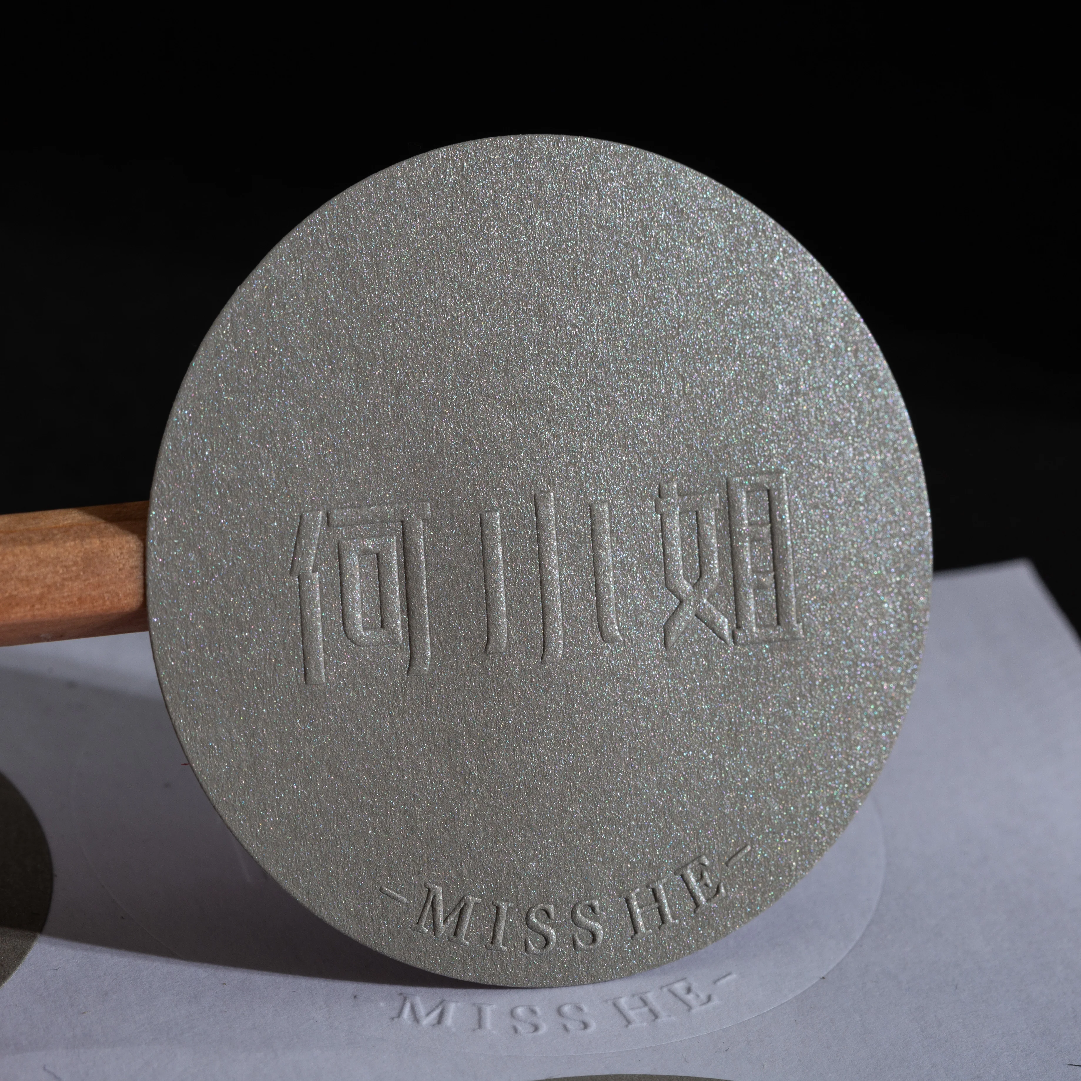 Factory luxury customized gray texture paper sticker 3d embossed logo self adhesive candle perfume labels