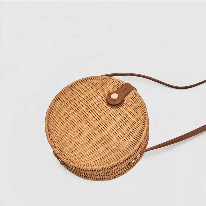 High quality portable lightweight cheap round summer rattan bag indonesia