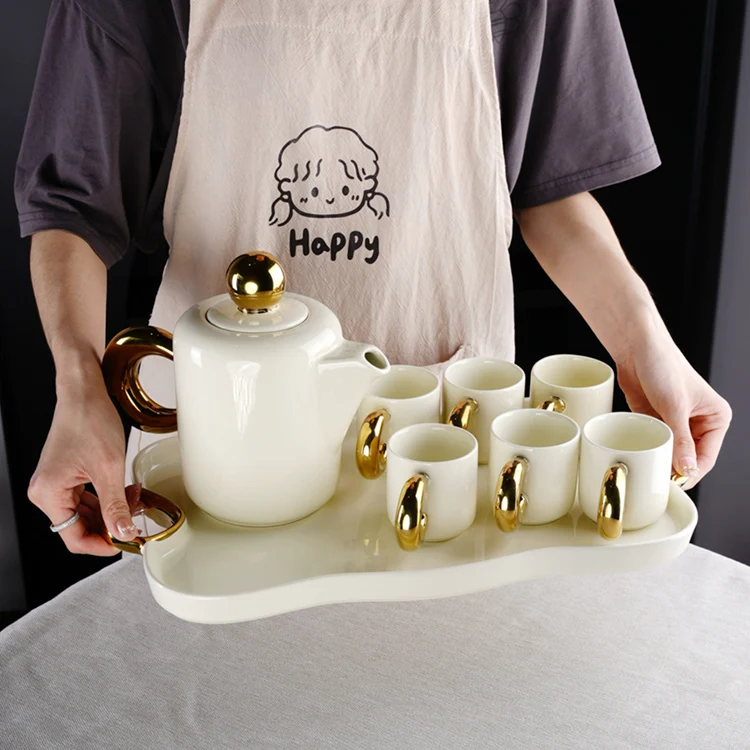 Modern nordic new design luxury gold and white ceramic set of cups tea pot and tray coffee and tea sets