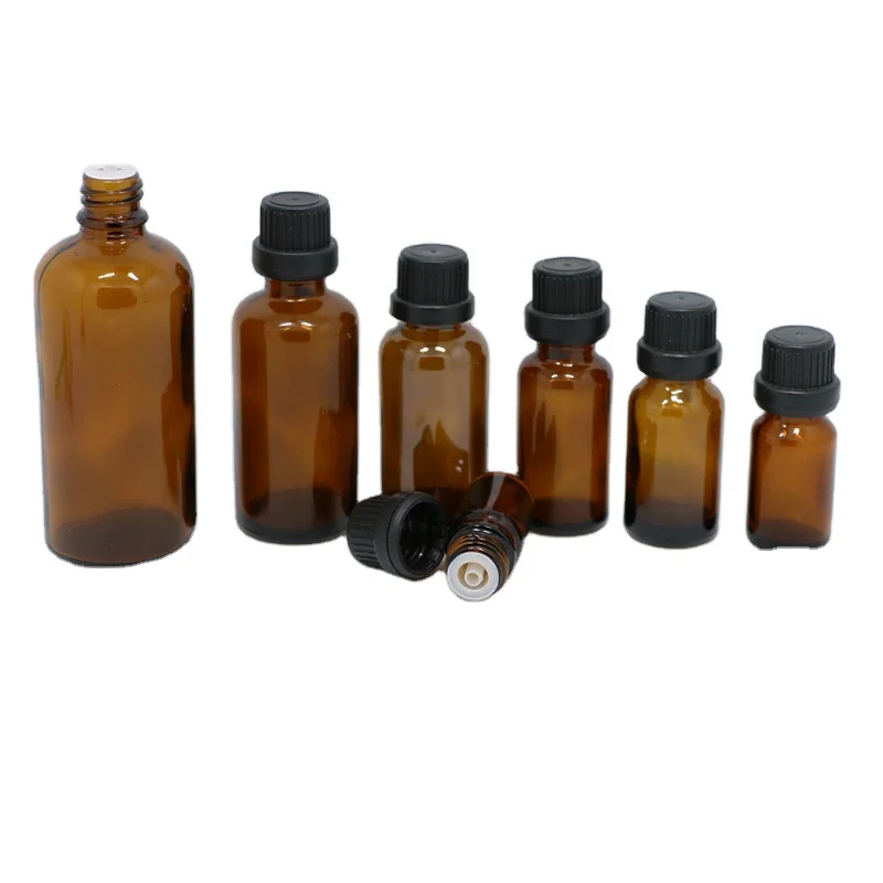 OEM Wholesale amber essential oil bottle 5ml 10ml 15ml 20ml 30ml 50ml 100ml DIN18 brown amber glass bottle with tamper proof cap