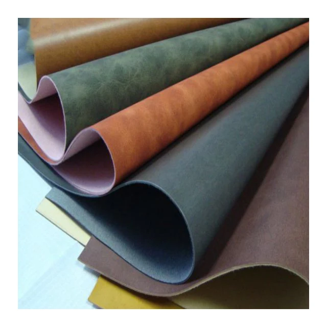 Hot Engraved Embossed Technology Pressure Change PU Leather for Jeans Label