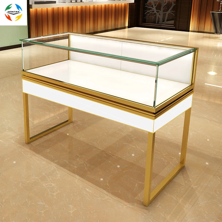 Высококачественный дизайн интерьера магазина косметики золотые стойкие ножки в форме банта витрина для духов с полувидением