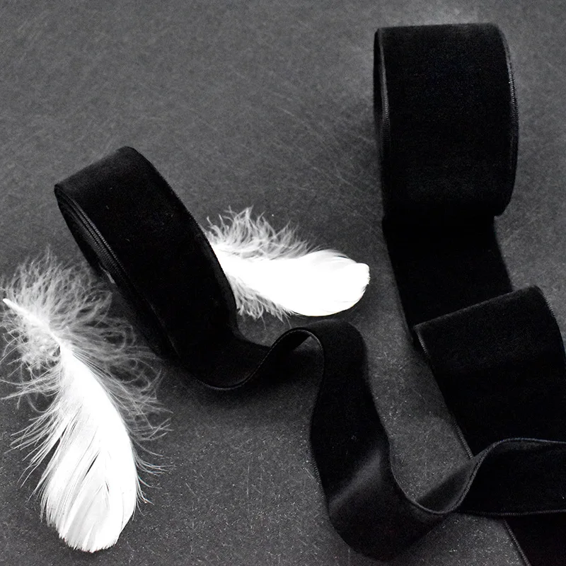 Manufacturers wholesale multi - specification spot white and black elastic velvet ribbon high - quality flocking ribbon