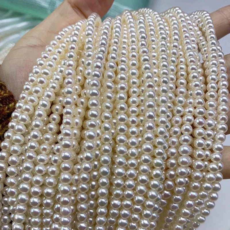 China cultured natural freshwater pearl string beads wholesale pine round white freshwater pearl for jewelry making