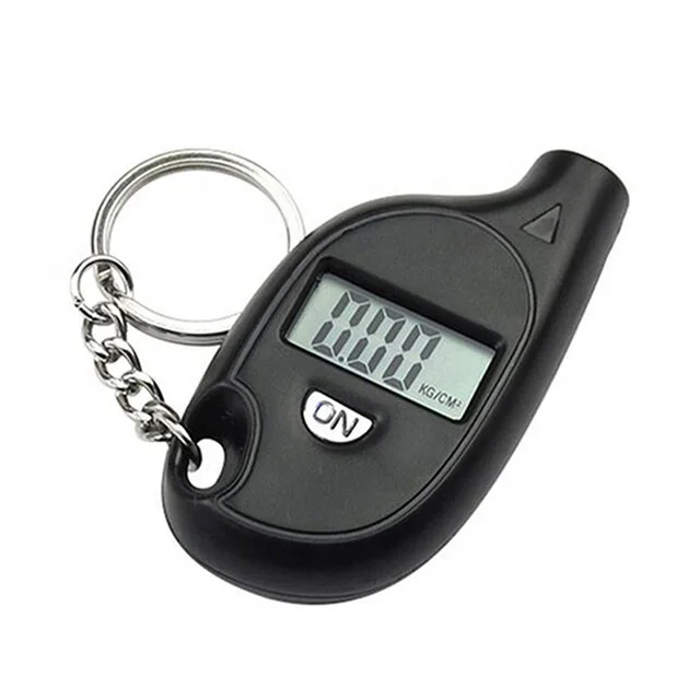 Digital display of mini key chain tire pressure gauge to measure automobile tires