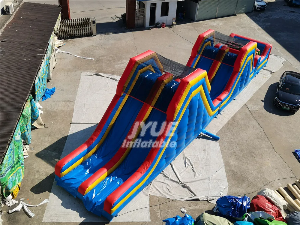 China Fabrica Obstaculo Inflable De Doble Tobogan