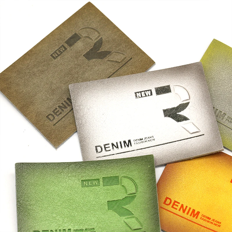 Wholesale Stylish Gradient Effect Washable Leather Patches With Design Metal Buckle Debossed Writing Men Jeans Leather Labels