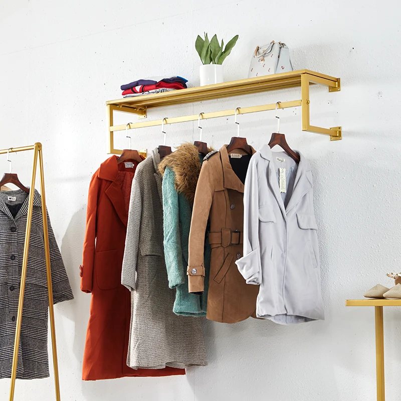 clothes shop display rack wall-mounted clothing rack decorative metal garment rack with storage shelf