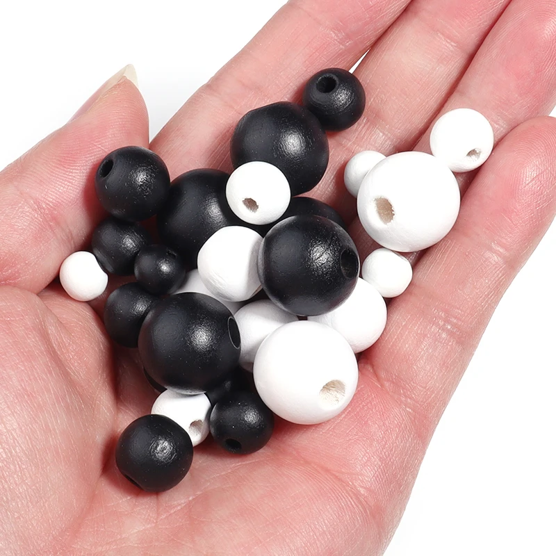Black and white beads with multiple specifications of wooden round beads are used for jewelry making decoration, and DIY jewelry
