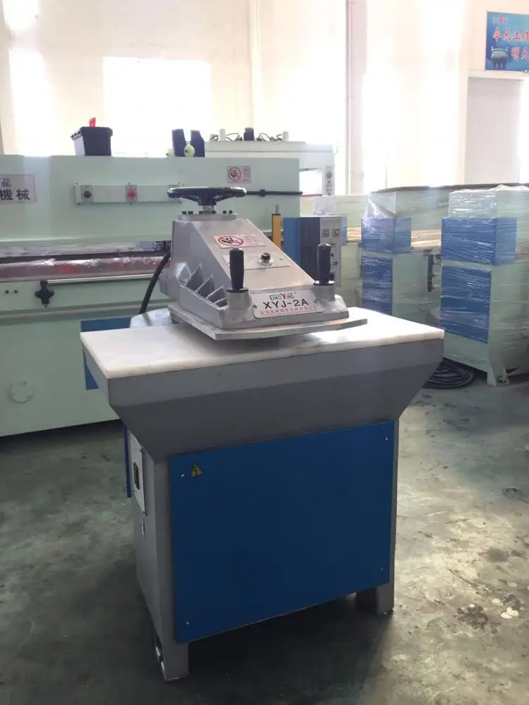 hydraulic swing arm leather cutting machine