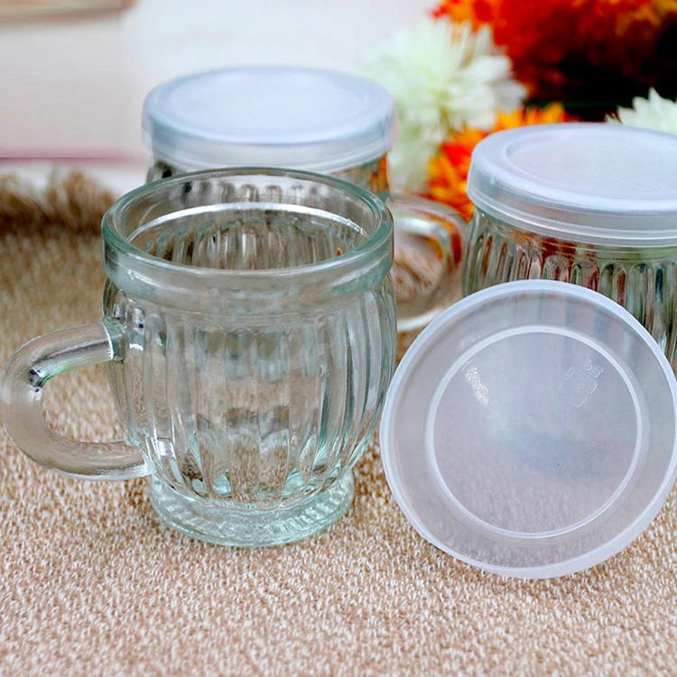 Xuzhou Stocks China Manufacture Wholesale Ribbed Pudding Bottle with Handle 130ml Coffee Tea Drinking Glass Cup