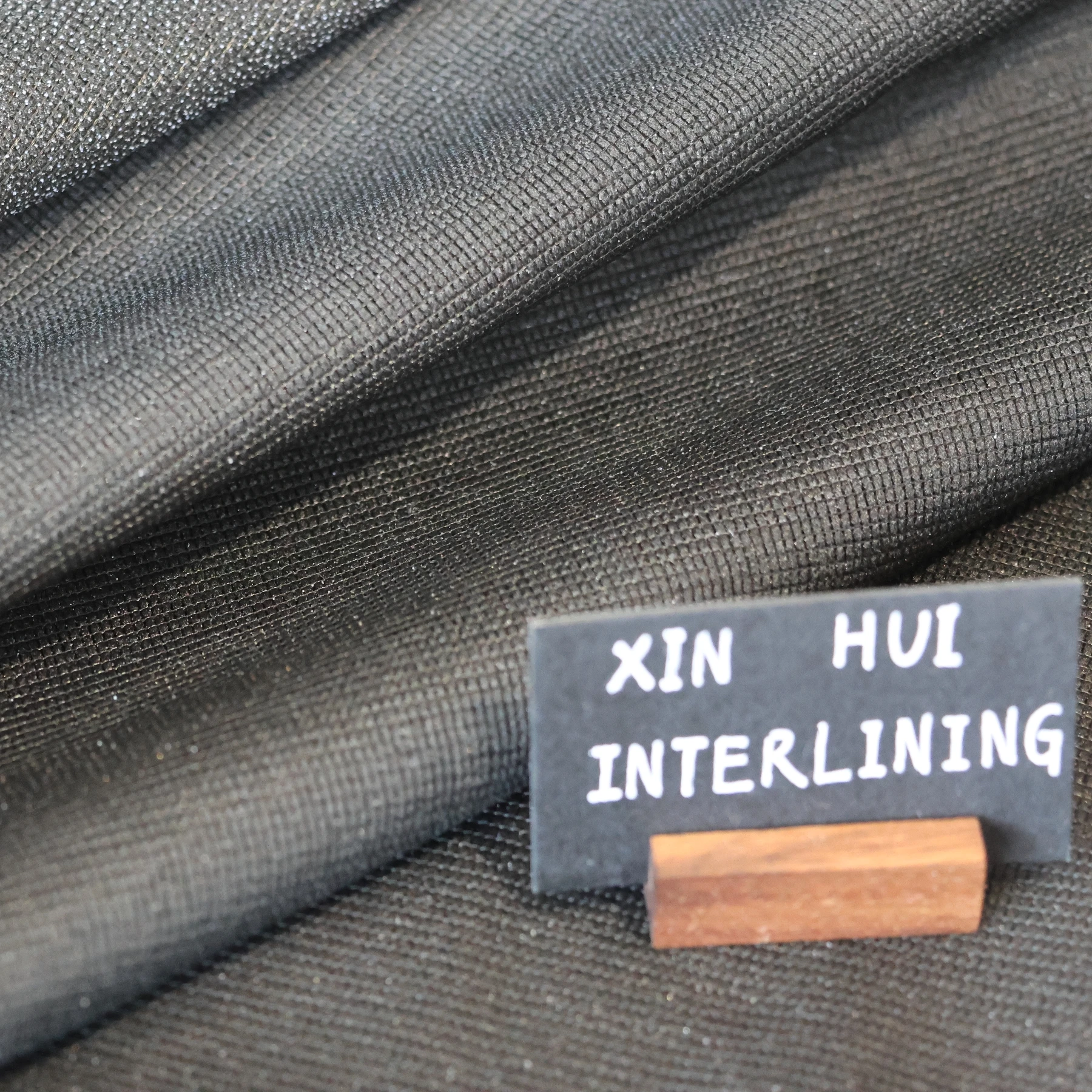 L/C support factory 100% Polyester Stretch Fusible Woven Warp Knitted Interlining