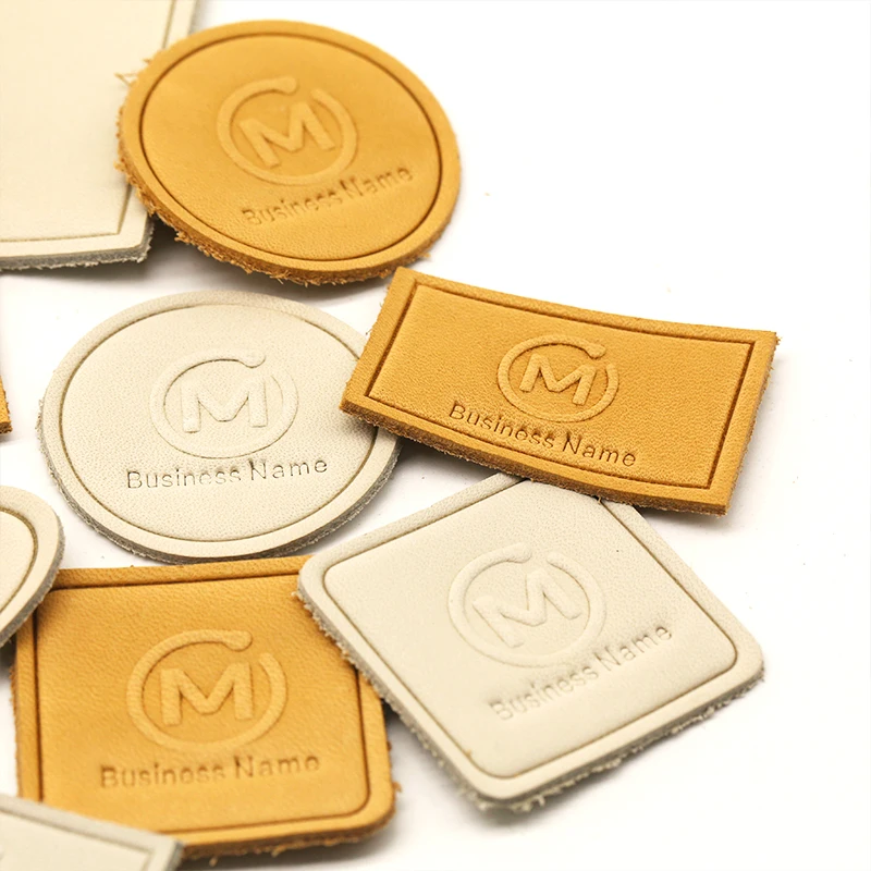 Best Price Custom Shape Embossed Brand Triangle Round Rectangle Clothing Tag Metal Casting Pu Leather Patches
