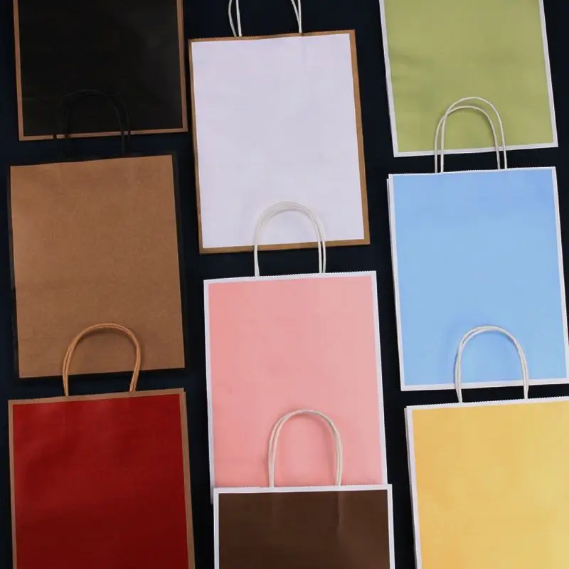 
Free design printing logo paper bags custom shopping gift kraft paper bag with twisted handles 